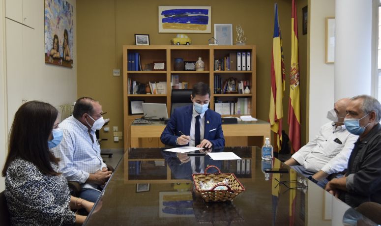 firma convenio Entre Culturas